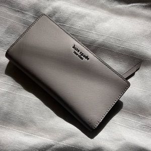 Gray Kate Spade Wallet in good condition.